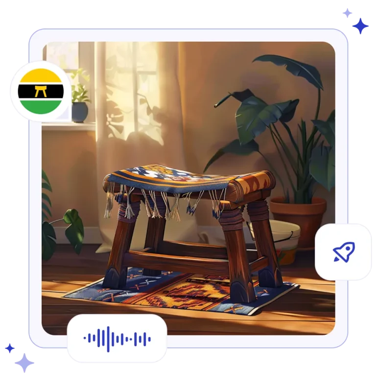 A beautifully carved Ashanti wooden stool resting on a display of brightly colored, geometric woven Kente cloth from Ghana.